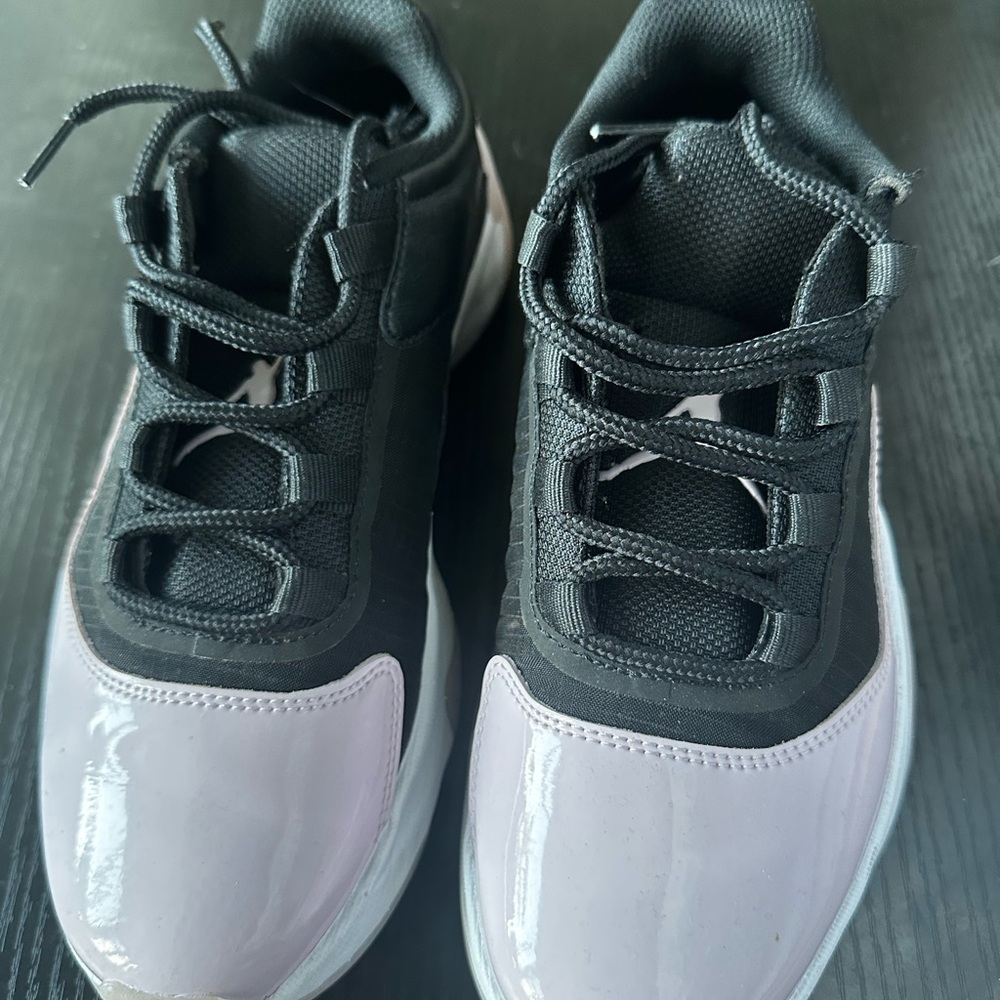 Jordan Black and Pink Athletic Shoes with Glossy Finish